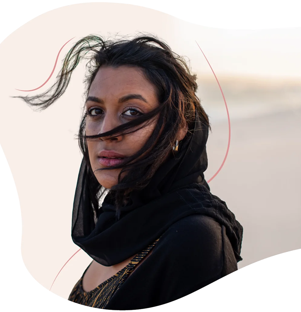 Woman with flower representing Arab women's health challenges